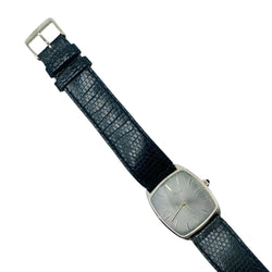 Montre BAUME & MERCIER en or jaune et cuir - Castafiore