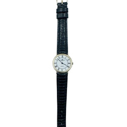 Montre BAUME & MERCIER en or jaune et cuir - Castafiore