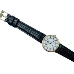 Montre BAUME & MERCIER en or jaune et cuir - Castafiore
