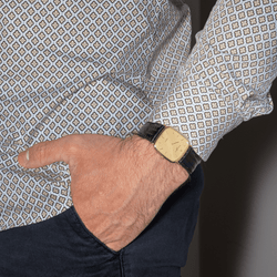Montre BAUME & MERCIER en or jaune, quartz et cuir - Castafiore