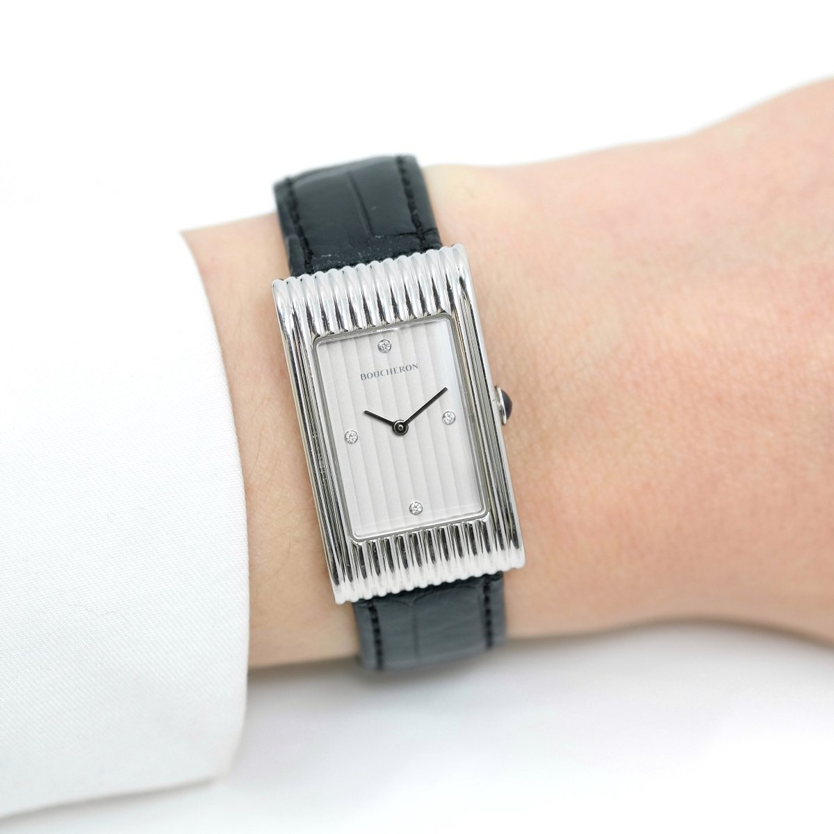 Montre BOUCHERON "Reflet" en acier, cuir et diamants - Castafiore