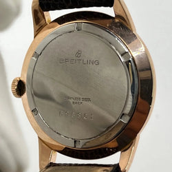 Montre BREITLING "Genève" plaqué or rose, acier et cuir - Castafiore