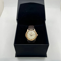 Montre BREITLING "Genève" plaqué or rose, acier et cuir - Castafiore