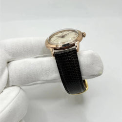 Montre BREITLING "Genève" plaqué or rose, acier et cuir - Castafiore