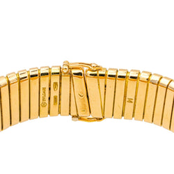 Montre BULGARI "Tubogas" en or jaune, quartz et saphir - Castafiore