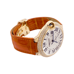 Montre CARTIER "Ballon Bleu" en or jaune, or rose, argent, cuir et diamants - Castafiore