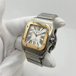 Montre CARTIER "Santos 100" en or jaune et acier inoxydable - Castafiore