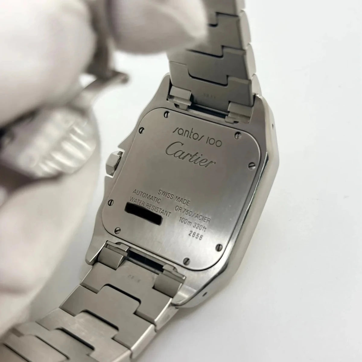 Montre CARTIER "Santos 100" en or jaune et acier inoxydable - Castafiore