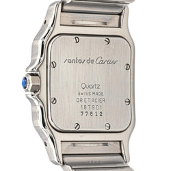 Montre Cartier "Santos" en or jaune, acier, saphir, spinelle et quartz - Castafiore