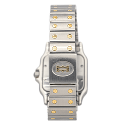 Montre Cartier "Santos" en or jaune, acier, saphir, spinelle et quartz - Castafiore