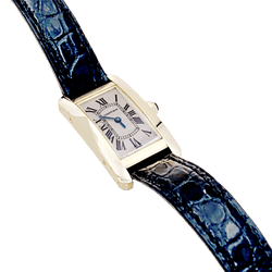 Montre CARTIER "Tank Américaine" en or jaune, acier et cuir - Castafiore