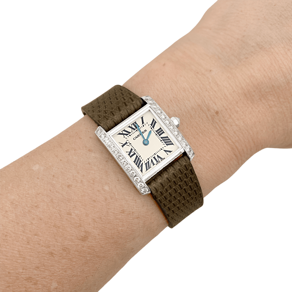 Montre CARTIER "Tank Française" en or blanc, cuir, acier et diamants - Castafiore