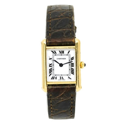 Montre CARTIER "Tank Louis" en or jaune, cuir, quartz et saphir - Castafiore