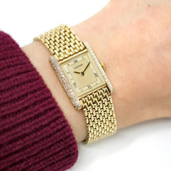 Montre CARTIER "Tank Louis" en or jaune et diamants - Castafiore