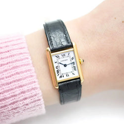 Montre CARTIER "Tank Louis Médium" en or jaune - Castafiore