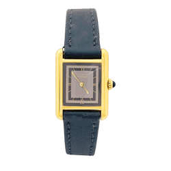 Montre CARTIER, "Tank Must", argent plaqué or et cuir - Castafiore