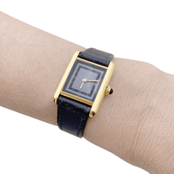 Montre CARTIER, "Tank Must", argent plaqué or et cuir - Castafiore