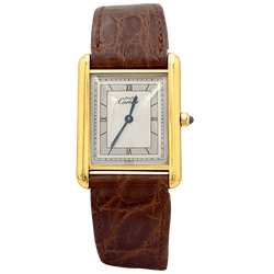 Montre CARTIER "Tank Must" en argent, acier, plaqué or et cuir - Castafiore