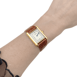 Montre CARTIER "Tank Must" en argent, acier, plaqué or et cuir - Castafiore