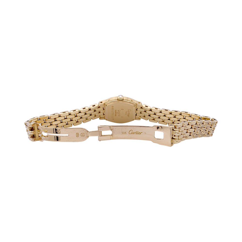 Montre Cartier "Tortue" or jaune, diamants, nacre. - Castafiore