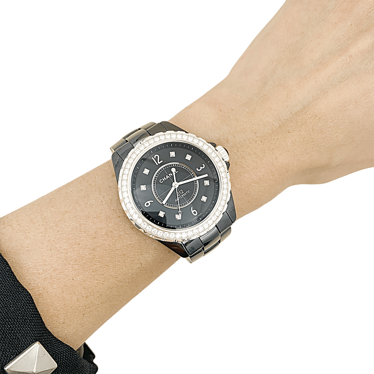 Montre Chanel, "J12", céramique noire, diamants. - Castafiore
