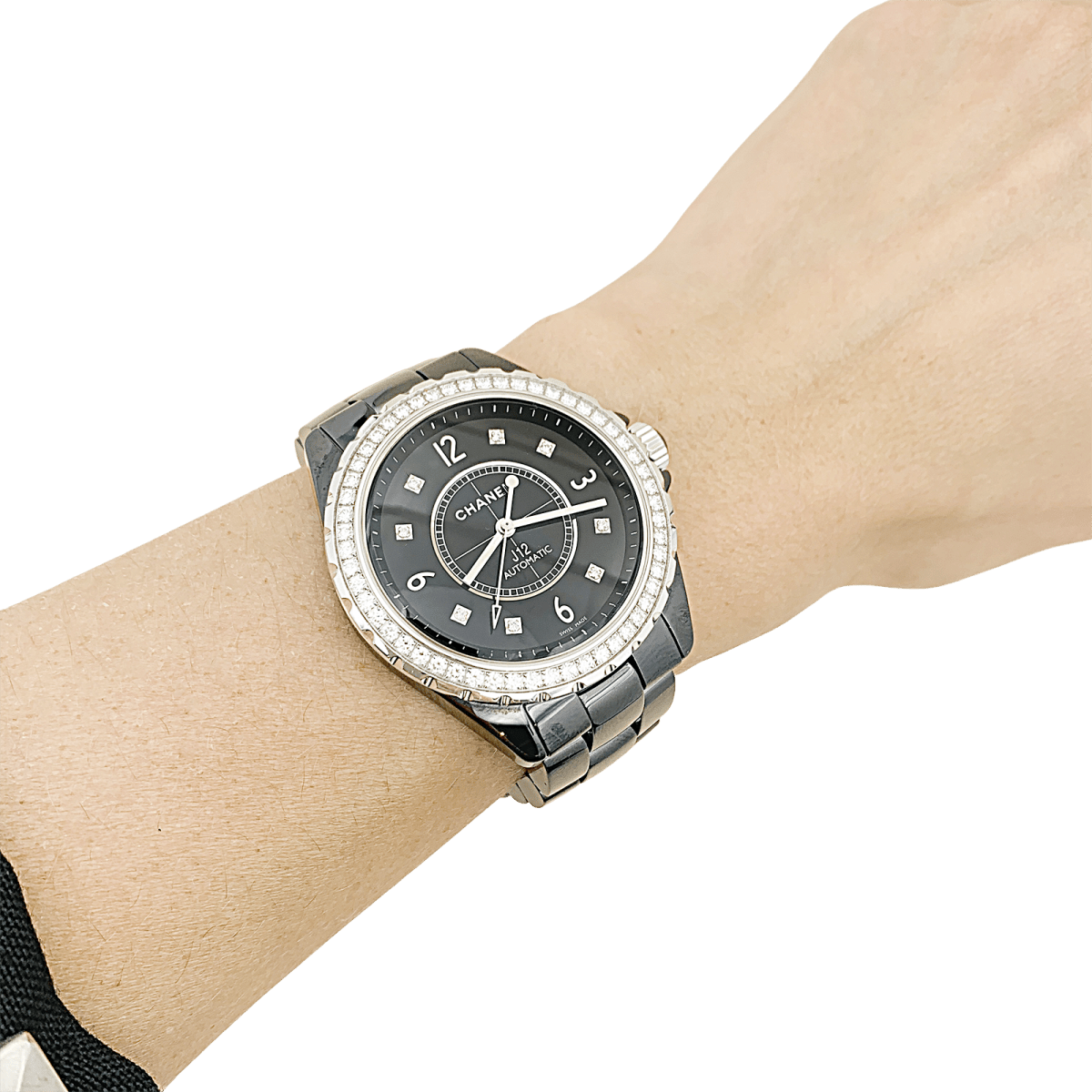 Montre Chanel, "J12", céramique noire, diamants. - Castafiore