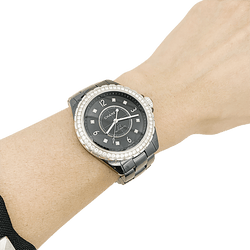 Montre Chanel, "J12", céramique noire, diamants. - Castafiore