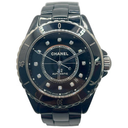 Montre CHANEL "J12" en céramique et diamants - Castafiore