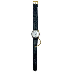 Montre CHAUMET "Élysées" en or jaune, acier, cuir et diamant - Castafiore