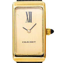 Montre CHAUMET en or jaune et cuir - Castafiore