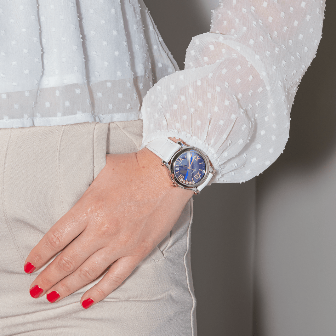 Montre CHOPARD "Happy Sport" en or rose, acier, saphir, cuir et diamants - Castafiore