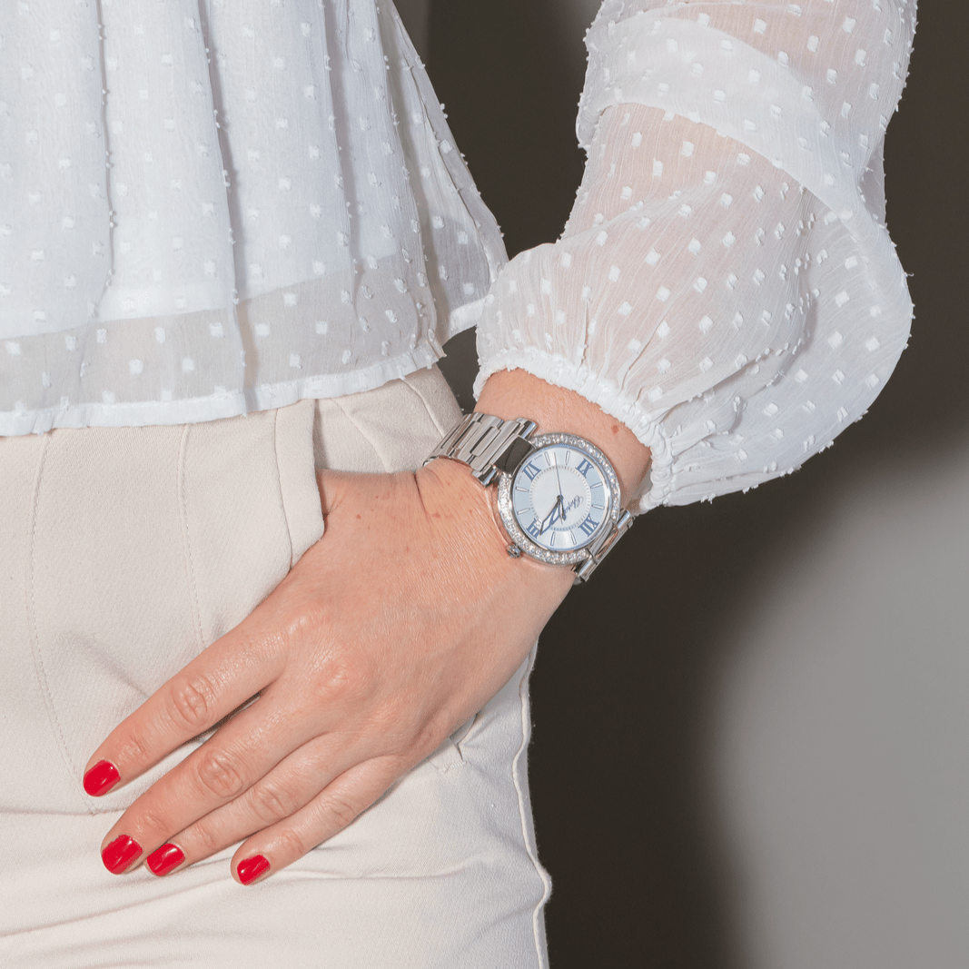 Montre CHOPARD "Impériale" en acier, nacre, améthyste, saphir et diamants - Castafiore