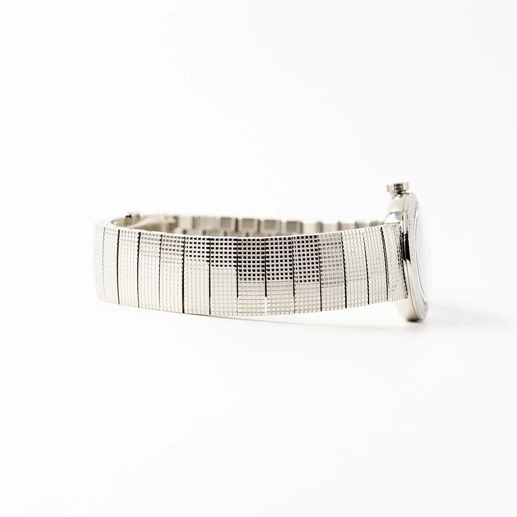 Montre de dame DIOR "La Baby D" en acier, nacre et diamants - Castafiore