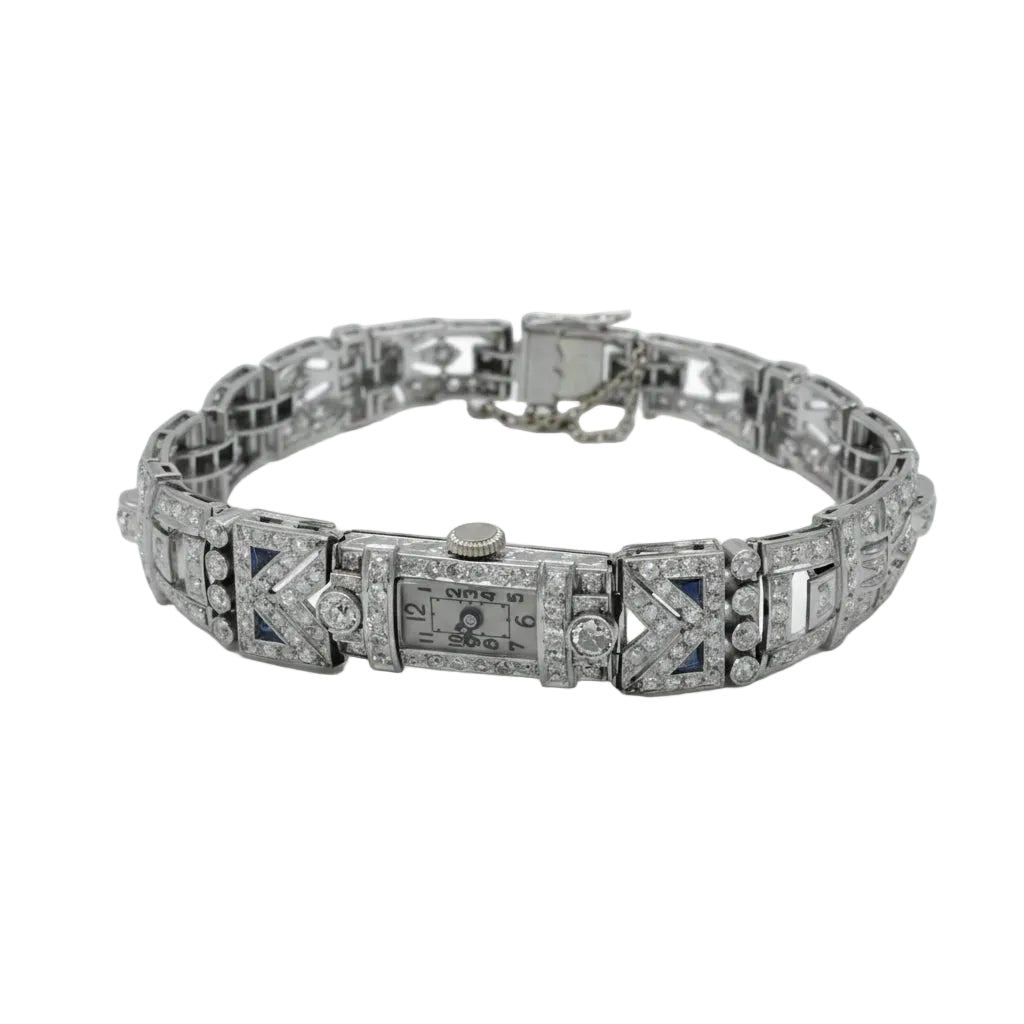 Montre de femme en or blanc, platine et diamants - Castafiore