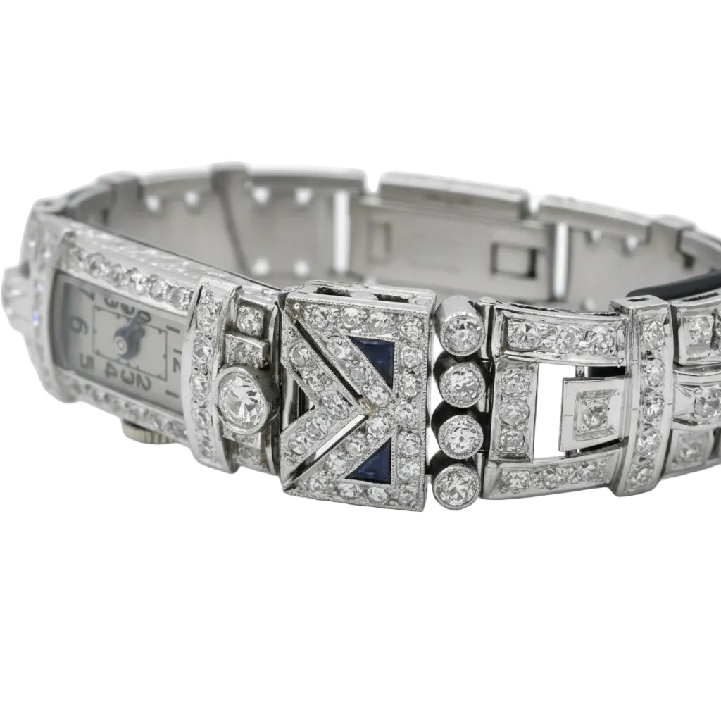 Montre de femme en or blanc, platine et diamants - Castafiore