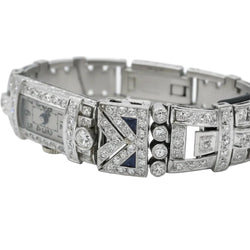 Montre de femme en or blanc, platine et diamants - Castafiore