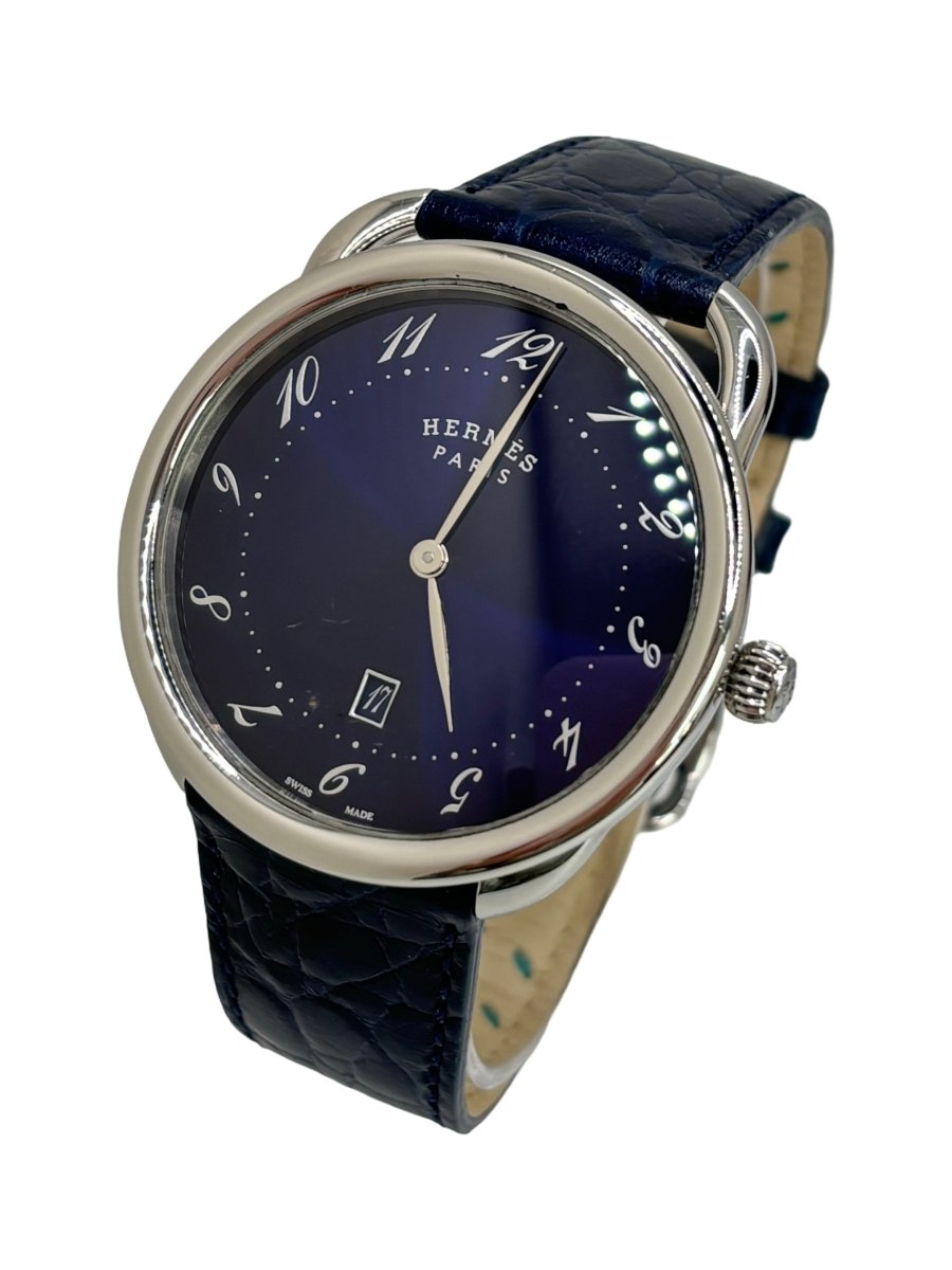 Montre HERMÈS "Arceau" en acier et cuir - Castafiore
