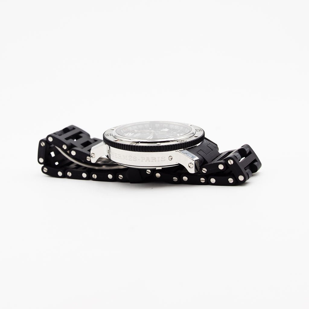 Montre HERMÈS "Clipper Chrono" en acier et caoutchouc - Castafiore