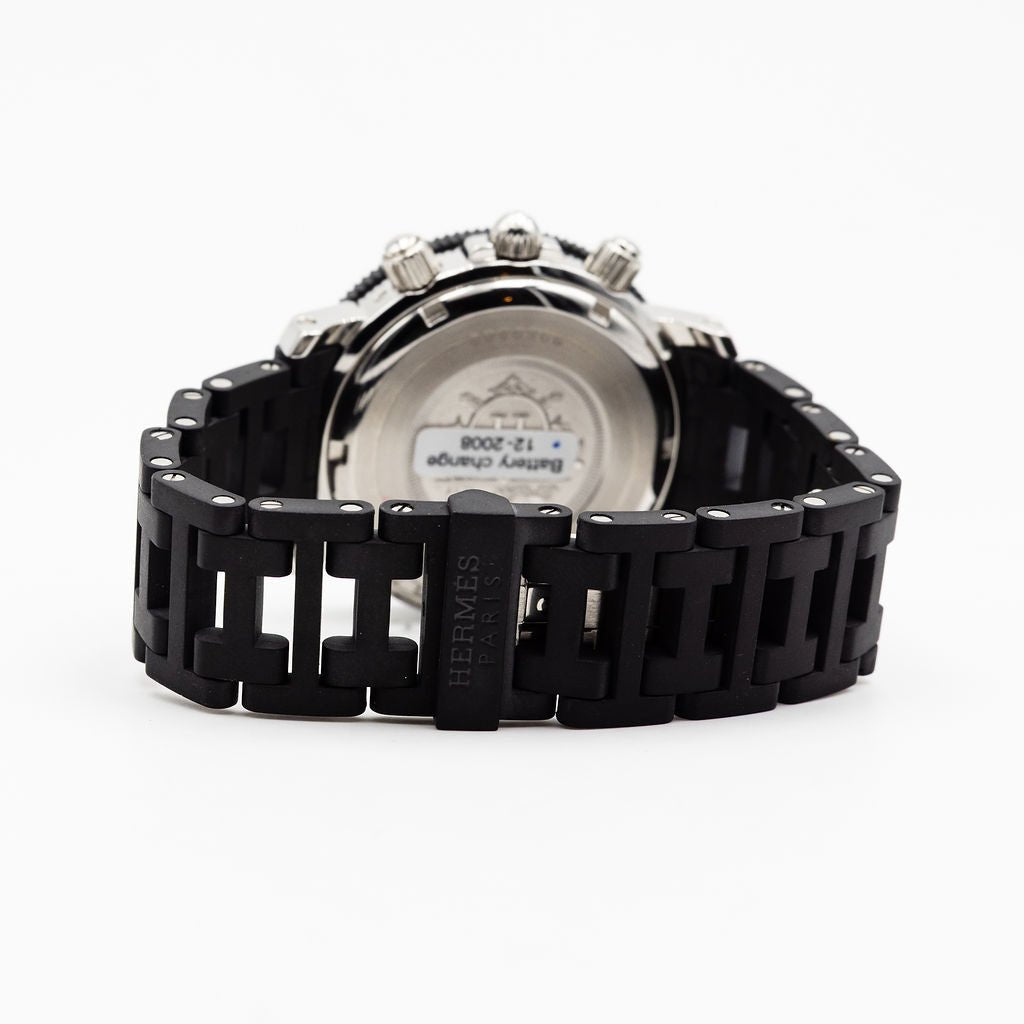 Montre HERMÈS "Clipper Chrono" en acier et caoutchouc - Castafiore