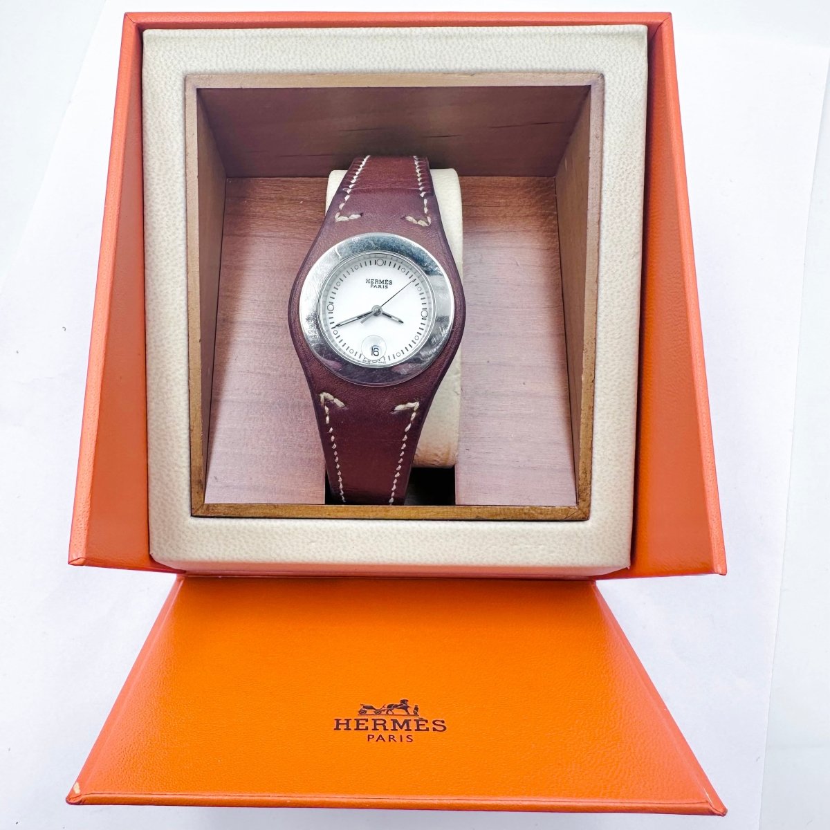Montre HERMÈS "Harnais" en cuir et acier - Castafiore