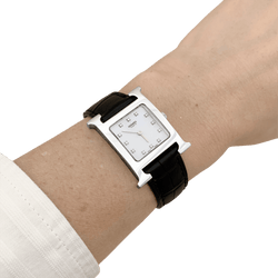 Montre HERMÈS "Heure H" en acier, nacre, cuir et diamants - Castafiore