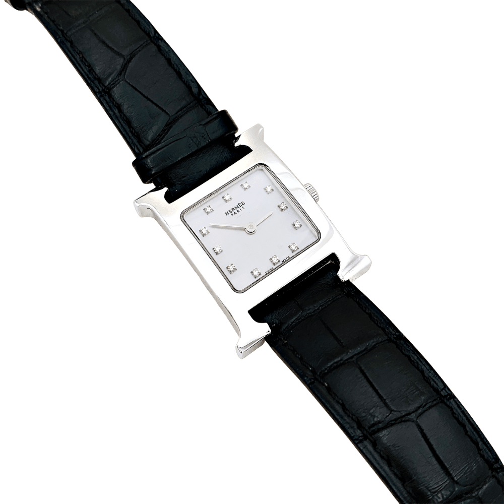 Montre HERMÈS "Heure H" en acier, nacre, cuir et diamants - Castafiore