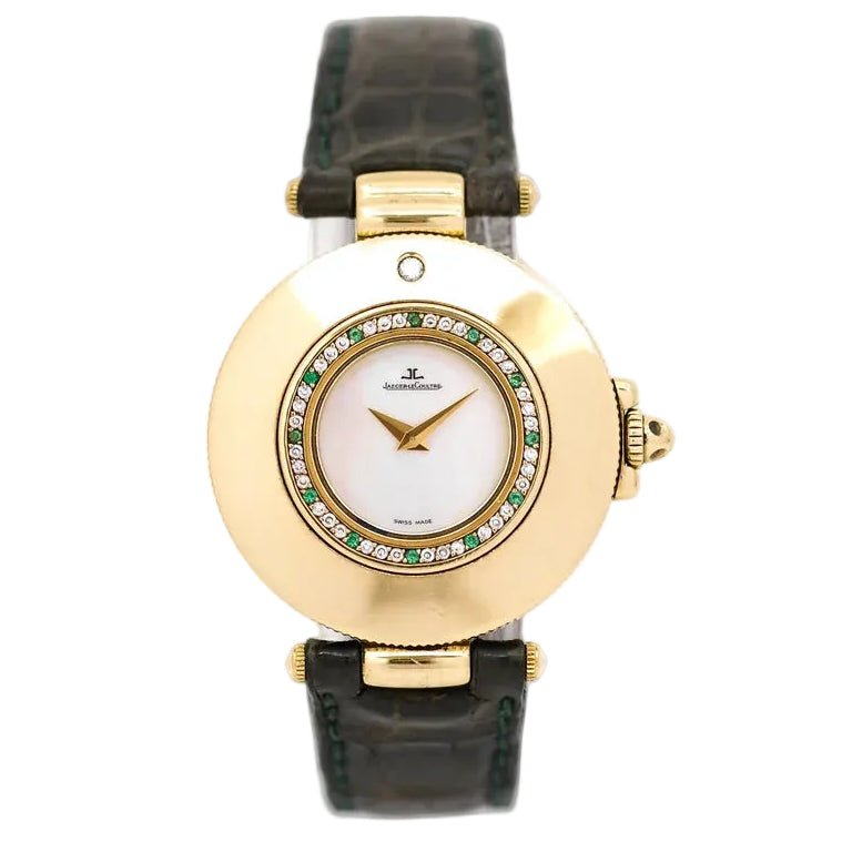 Montre JAEGER-LECOULTRE en or jaune, nacre, cuir, émeraudes et diamants - Castafiore