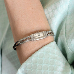 Montre LONGINES en platine, acier et diamants - Castafiore