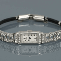 Montre LONGINES en platine, acier et diamants - Castafiore