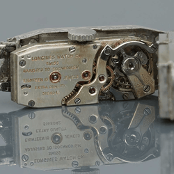 Montre LONGINES en platine, acier et diamants - Castafiore
