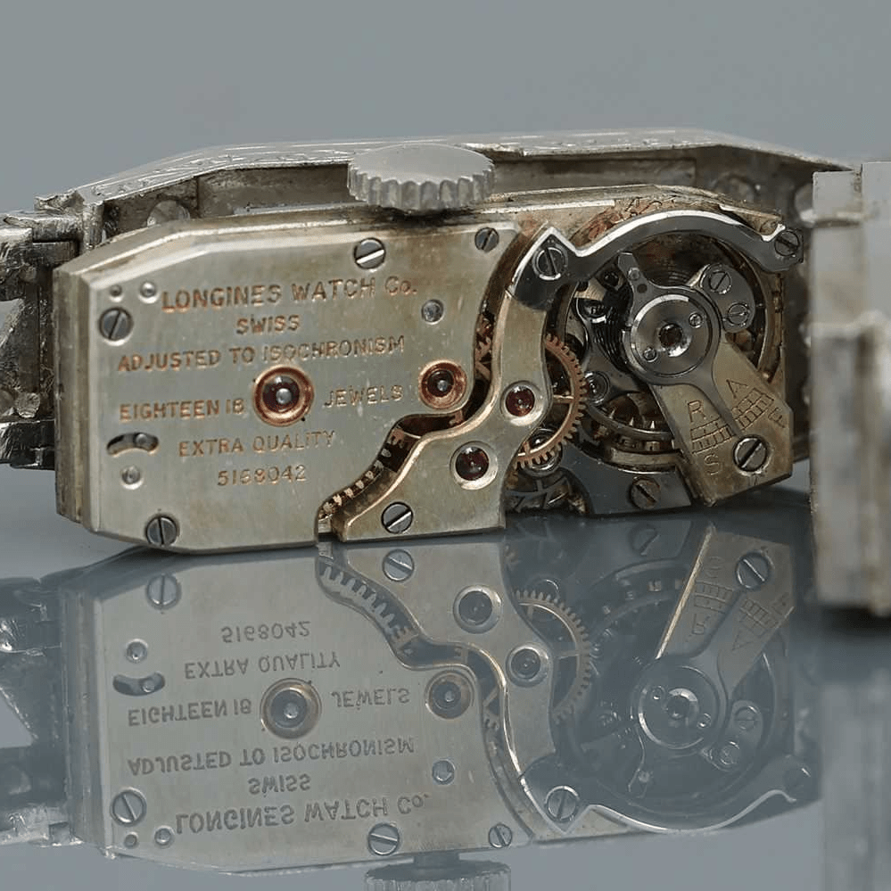 Montre LONGINES en platine, acier et diamants - Castafiore