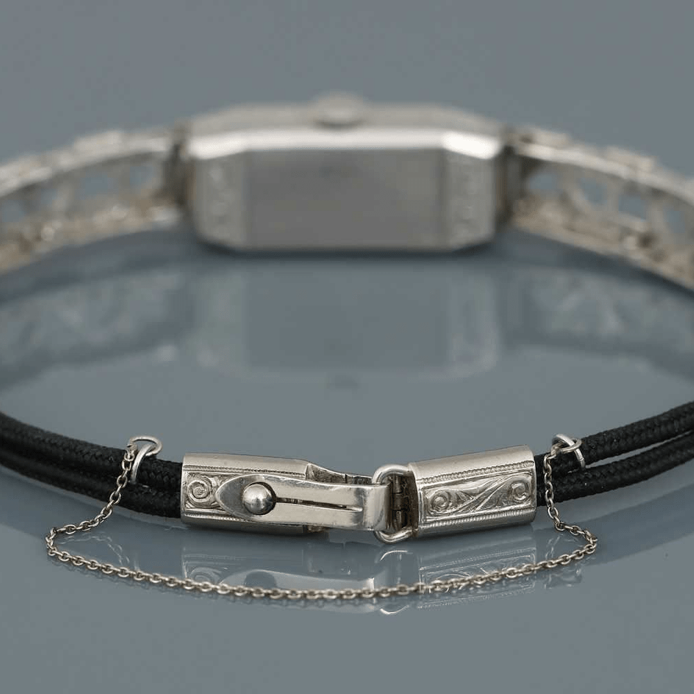 Montre LONGINES en platine, acier et diamants - Castafiore