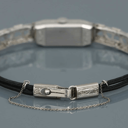 Montre LONGINES en platine, acier et diamants - Castafiore