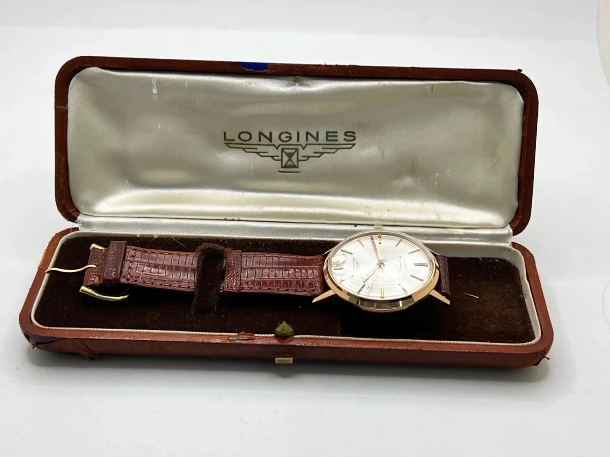 Montre LONGINES "Flagship" en or rose, acier et cuir - Castafiore